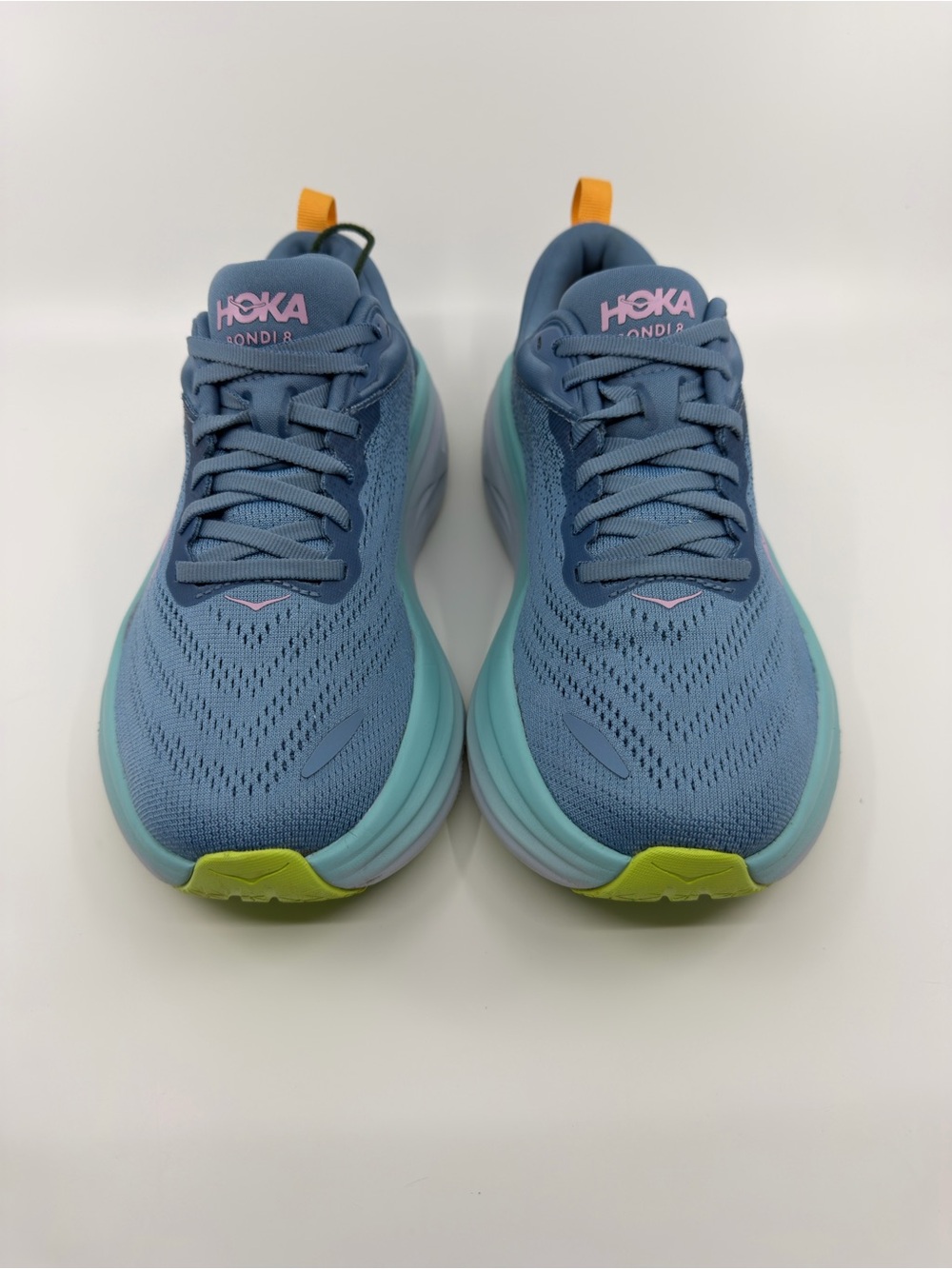 Hoka Women's Bondi 8 Shadow/Dusk blue colorway with pink and lime green details. - Picture 2 of 9